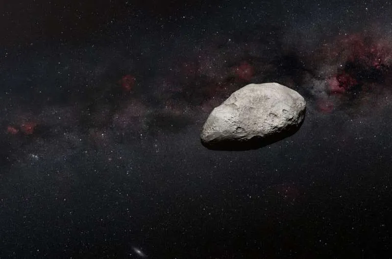艺术家的作品展示了一颗灰色、形状不规则的小行星。
This artist's impression shows a grey, irregularly-shaped asteroid against a dark background. Credit: N. Bartmann (ESA/Webb), ESO/M. Kornmesser and S. Brunier, N. Risinger (skysurvey.org)