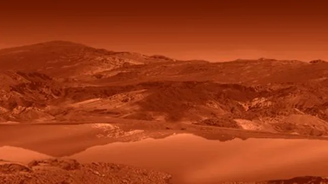 由艺术家笔下所展现，笼罩在浓密有机雾霾之下的土卫六地表，存在着暗色的沙丘与几乎平静无波的甲烷湖泊或海洋。从雾霾中飘落的有机物质颗粒，可能借由聚积与层层堆叠，形成像地球上的冰山一般，漂浮在湖泊或海洋上的岛屿。An artist's rendition of Titan's landscape features a hazy atmosphere, dark dunes, and mirror-smooth lakes and seas that resemble Earth's. On these bodies of liquid hydrocarbons, new research suggests that the appearance of 'magic islands' may be caused by floating organic solids. (Image credit: NASA/JPL)