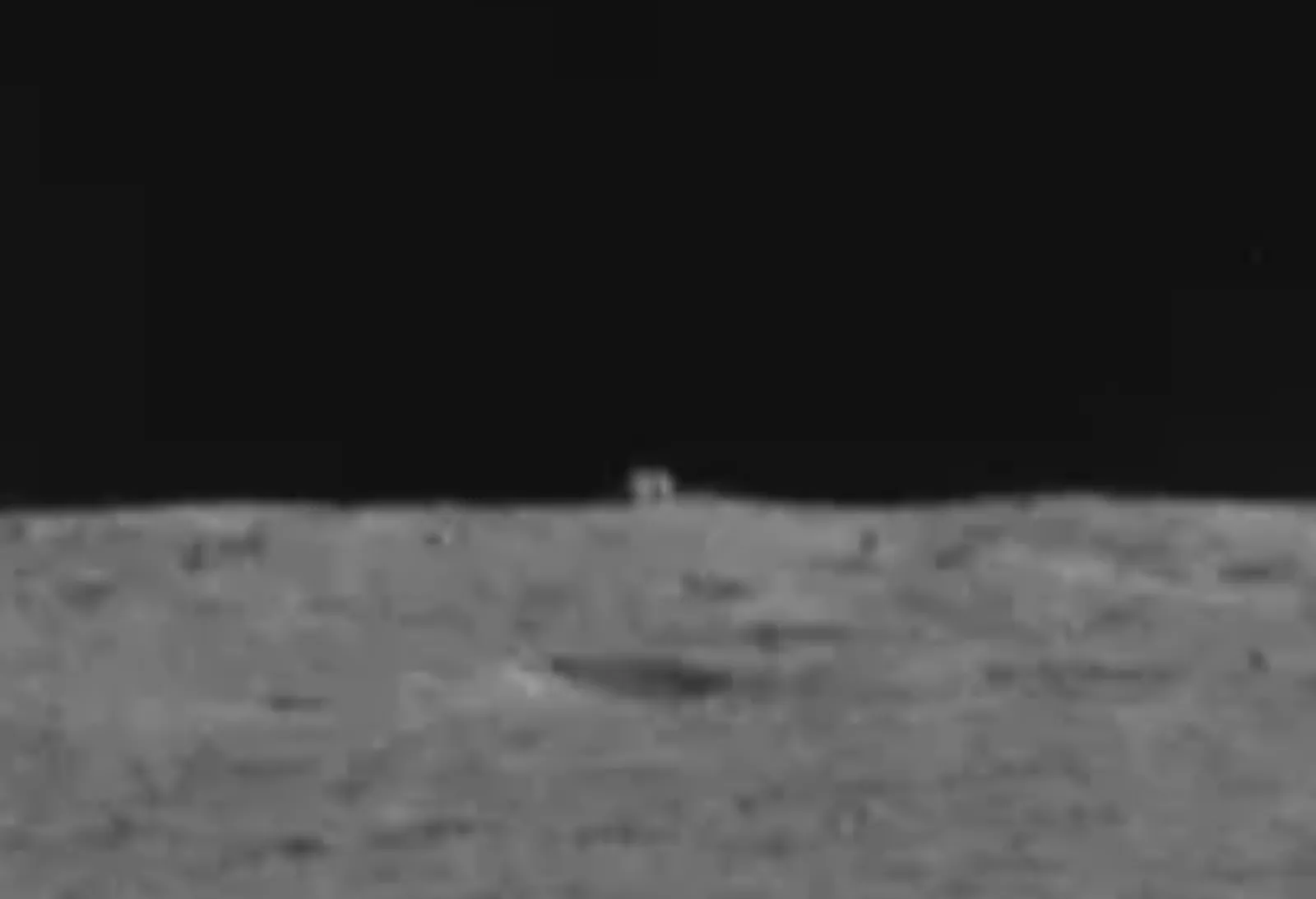 Yutu-2's view of the distant mystery cube. (Our Space/CNSA)